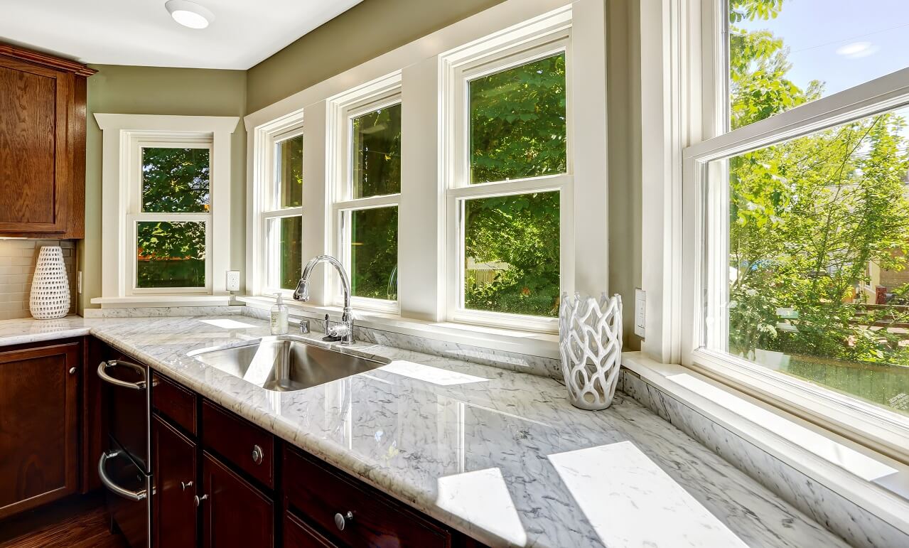 marble countertop in wood kitchen