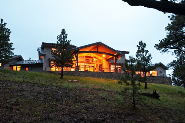 Lit-up house on a hill