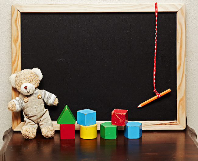 blackboard with bear and blocks