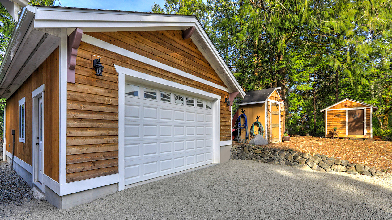 Brown and white detached garage