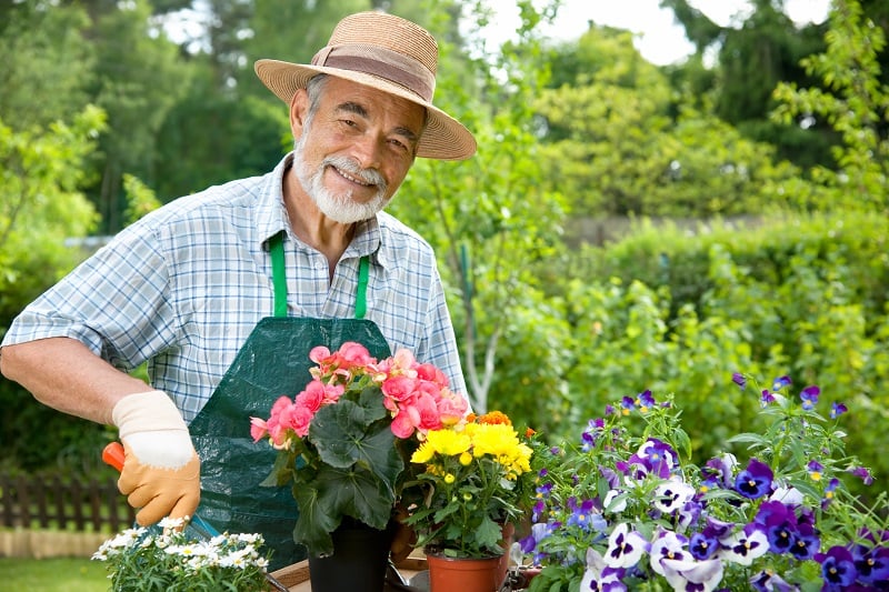 happy gardener with flowers
