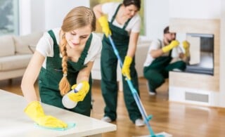 professional cleaners tiding up big apartment