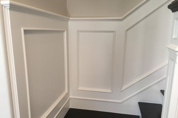 White Wainscoting Installed On Stairs