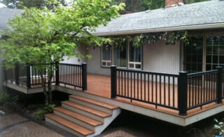 close-up of wood deck with steps and patio furniture