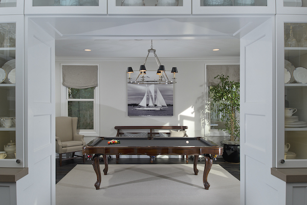 Pool table in white room