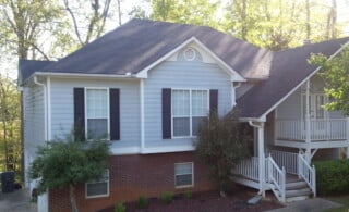 House on brick wall