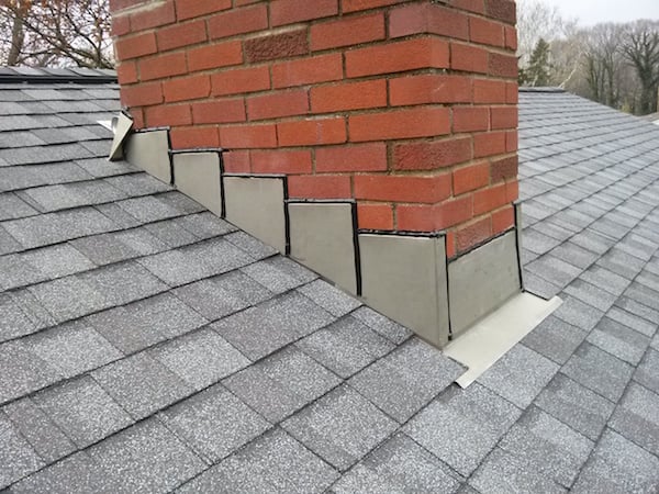 Roof flashing around chimney