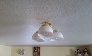 Popcorn ceiling with light