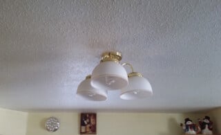 Popcorn ceiling with light