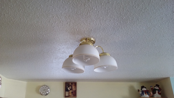 Popcorn ceiling with light