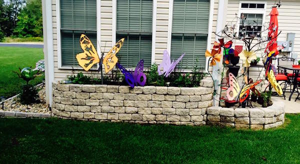 Raised garden bed with decor