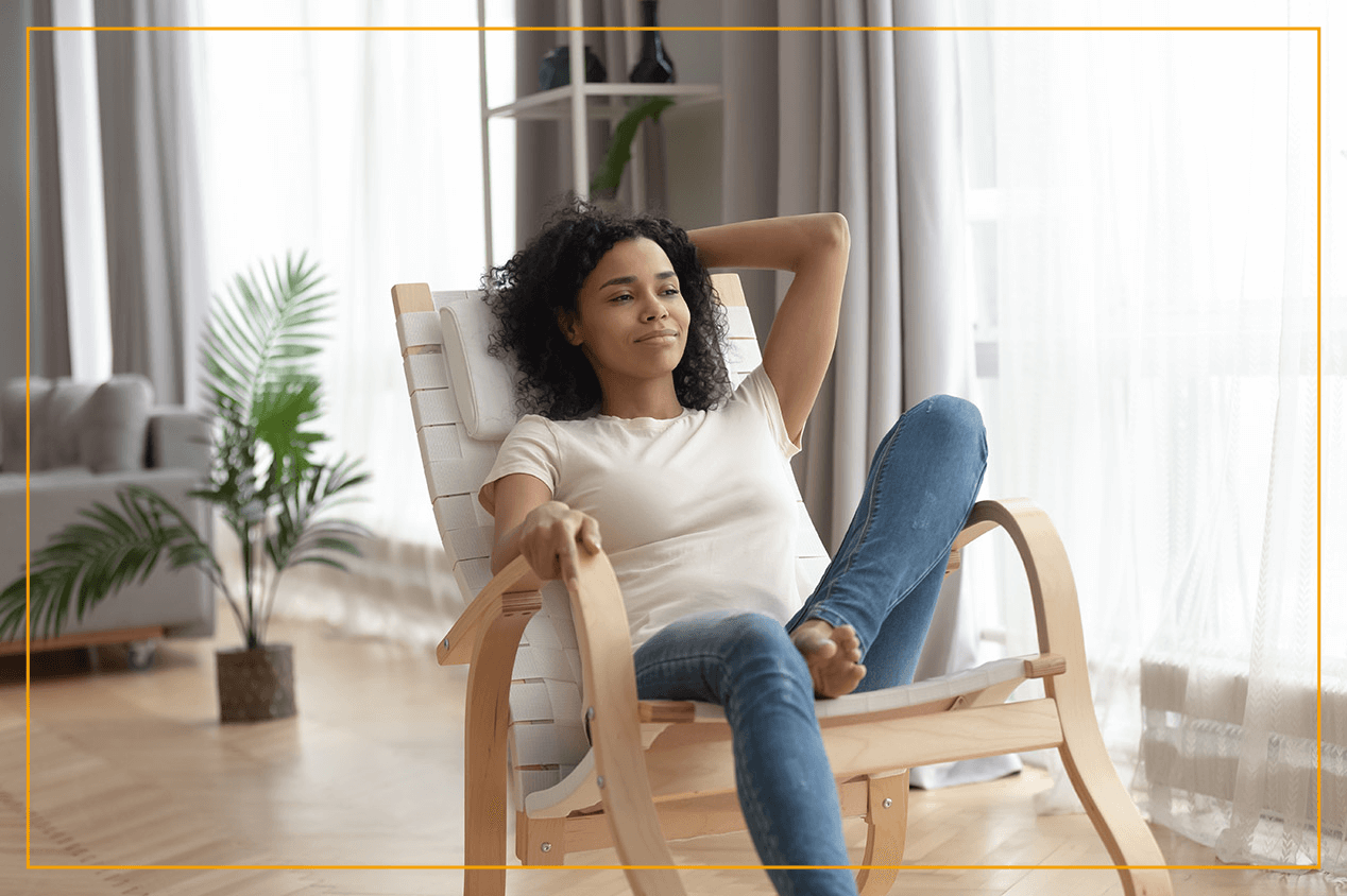 woman sitting in lounge chair