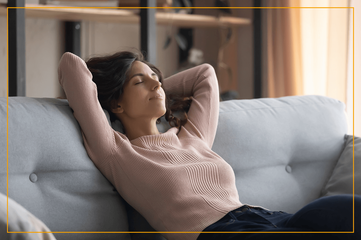 woman lounging on sofa