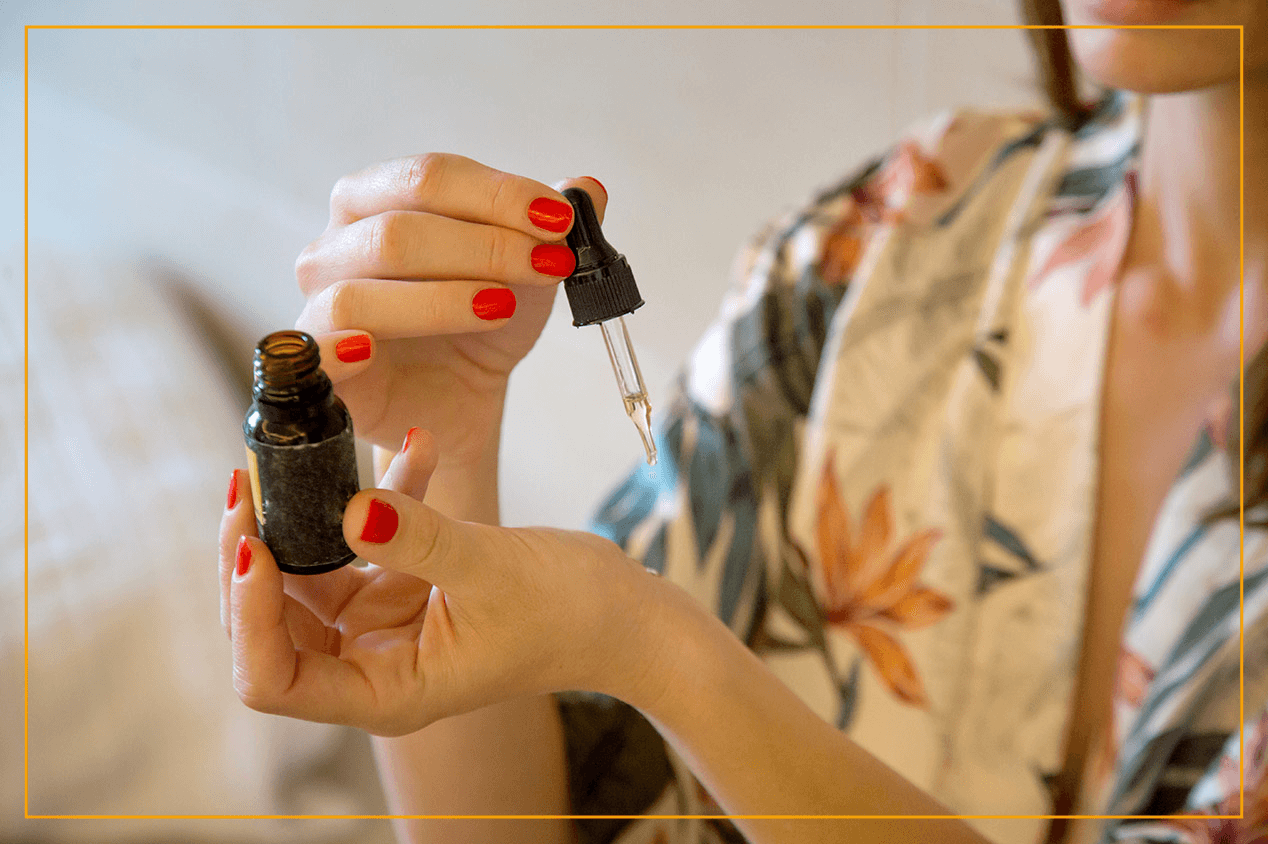 woman using essential oils