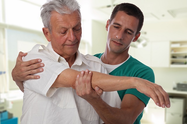 Senior getting physical therapy for sustained injury