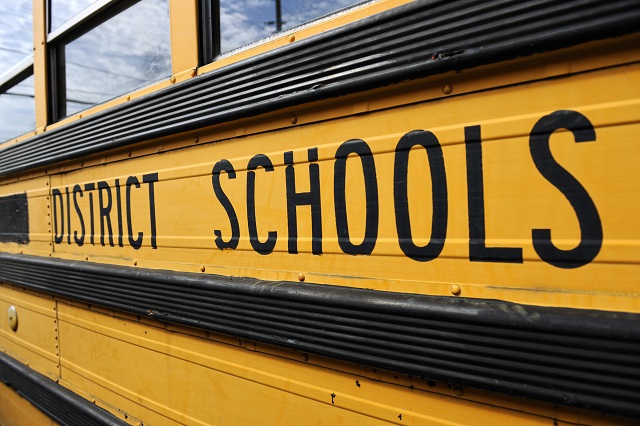 Side of an yellow district school bus