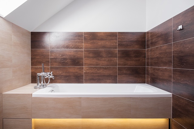 Luxury square bathtub in modern bathroom.