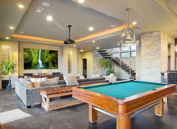 A newly remodeled basement with a pool table