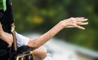 Elderly woman in wheelchair