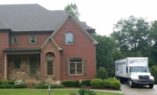 Moving truck in driveway