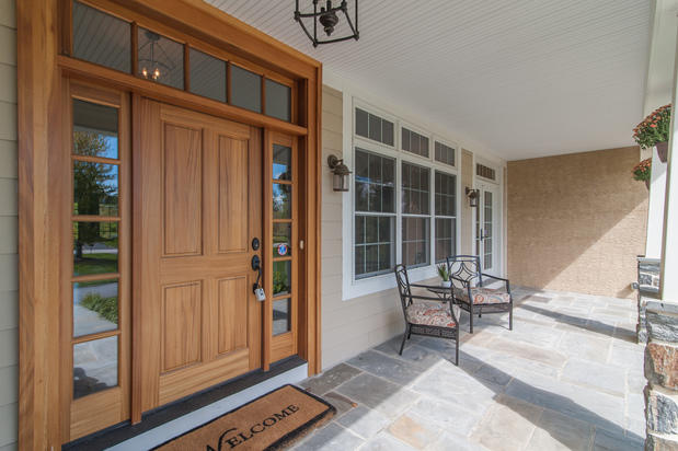 Wide Home Door on Front Porch