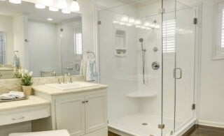 glass framed and fiberglass pan shower