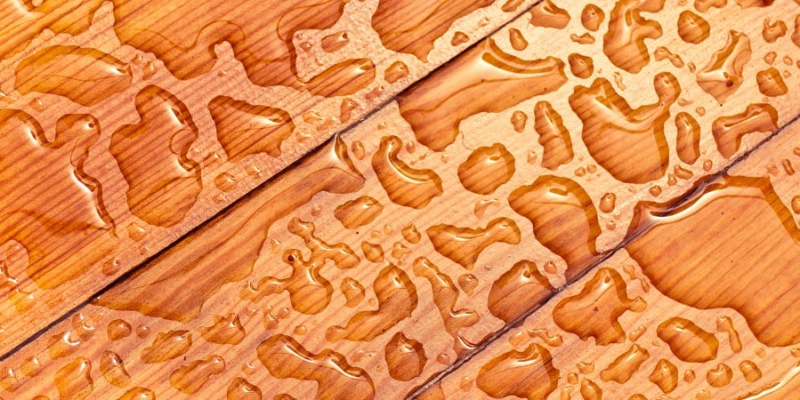 abstract raindrops pattern on wooden board