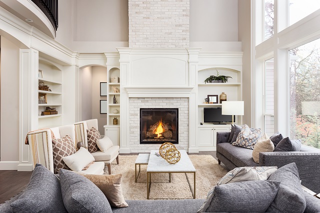 Painted white fireplace in living room