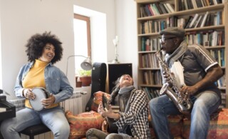 Band performing in home studio