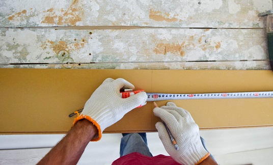 Prepare the laminate panel for cutting with an electric jigsaw.