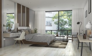 bedroom with laminate flooring