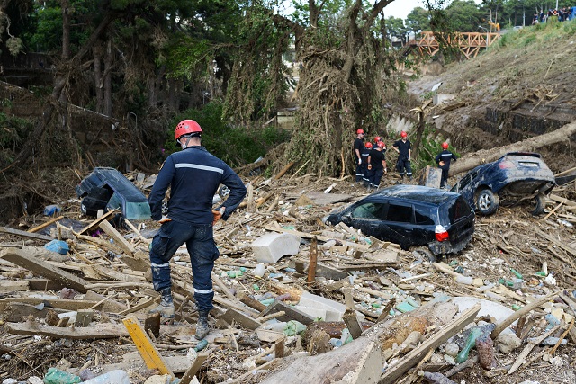 Rescue Service assorted debris after mudslide or flood