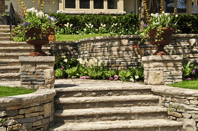 Natural stone landscaping with retaining walls