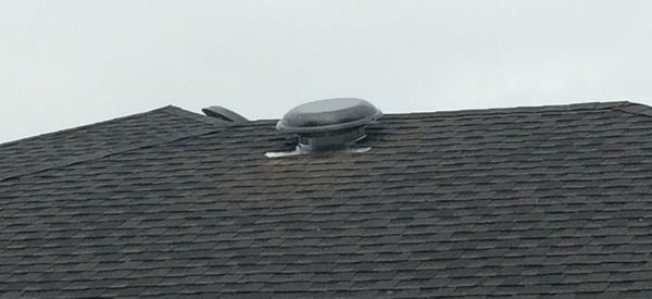 vent on shingle roof from attic fan
