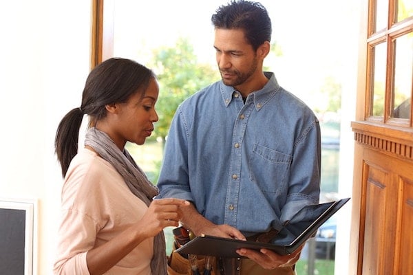 Homeowner talking to contractor