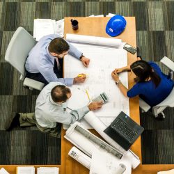 People working on blueprint