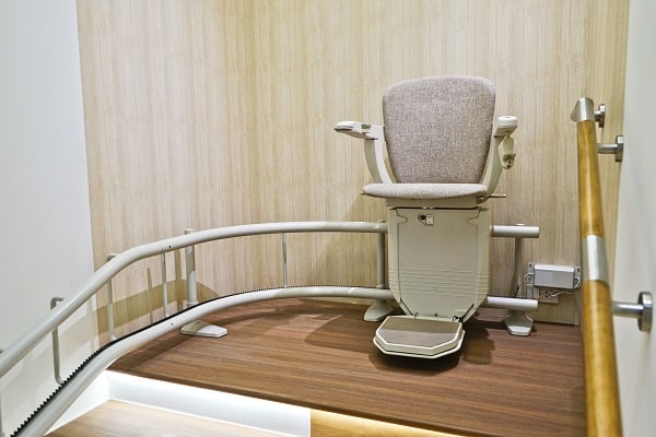 Stair lift on staircase for elderly people.