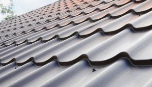 gray metal roofing against sky background