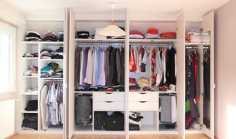 beautiful closet after a closet organizer worked