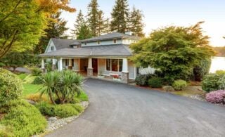 House with long concrete driveway