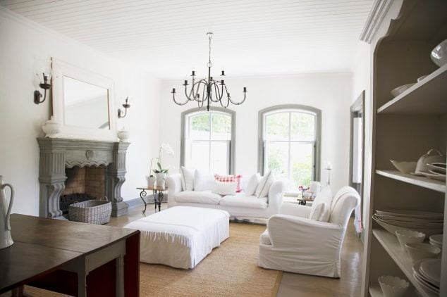 Farmhouse living room with black chandelier