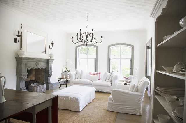 Farmhouse living room with black chandelier