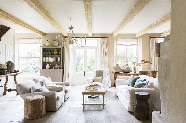 White sofas and curtains in rustic living room