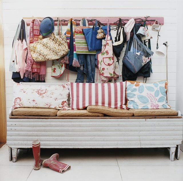 Mudroom coat rack and bench with quaint cushions