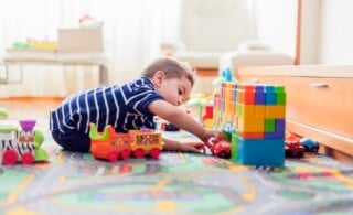 child playing in playroom