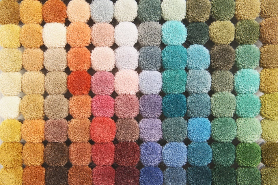 colorful palette of round carpet samples