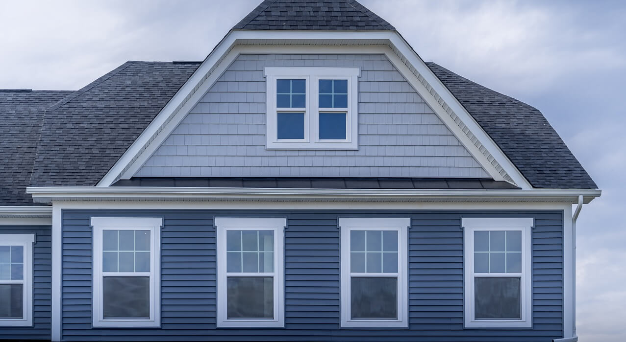 white windows on blue house