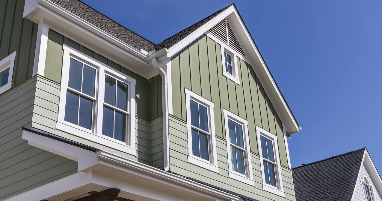 white vinyl windows on residential house