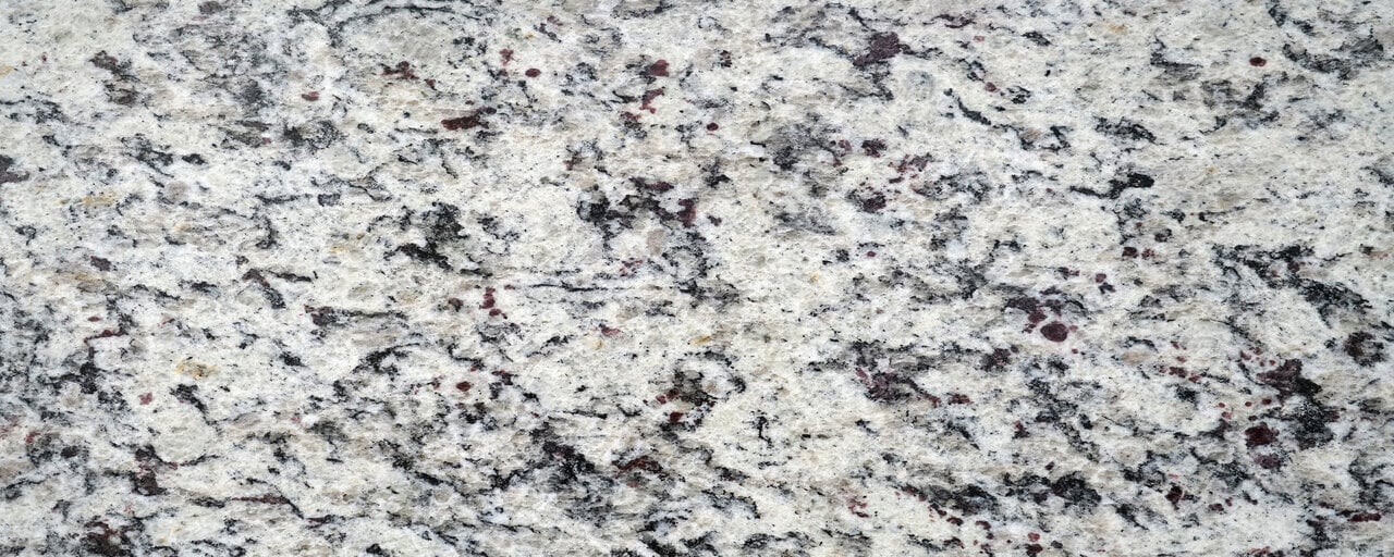 close up granite shower tile