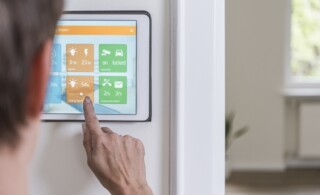 Woman using smart home screen